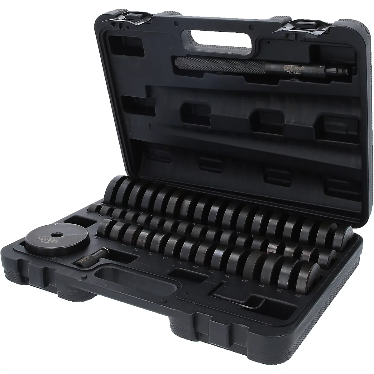 Schwarzer Werkzeugkoffer mit verschiedenen runden Werkzeugen und einem Stift.